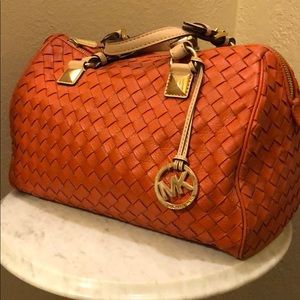 Micheal Kors pumpkin woven leather purse